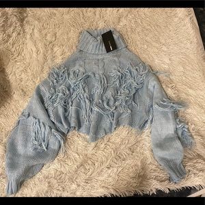 FASHION NOVA BLUE FRINGE CROP SWEATER